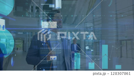 Image of financial data processing over businessman in office Image of financial data processing over businessman in office 128307861