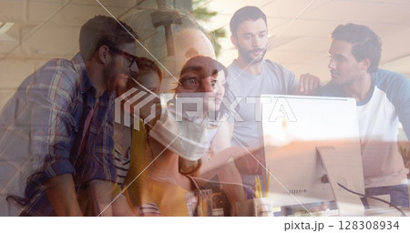 Image of Caucasian woman in mask for protection over people working in office Image of Caucasian woman in mask for protection over people working in office 128308934