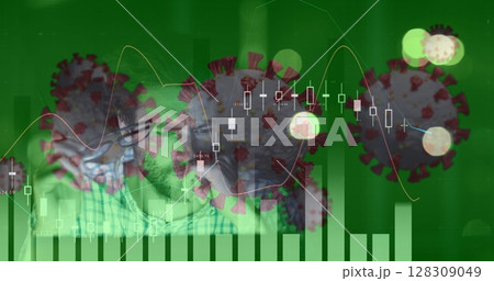 Analyzing stock market graphs, masked individuals with coronavirus illustrations overlay 128309049