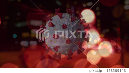 Image of Covid 19 cell spinning over out of focus traffic and city lights 128309148