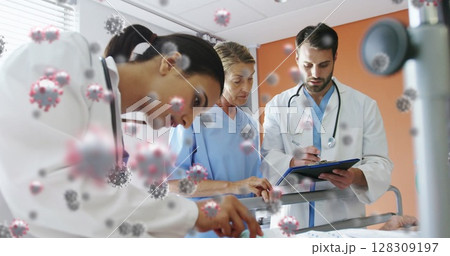 Digital composite image of covid-19 cells floating against male doctor and female medical profession 128309197