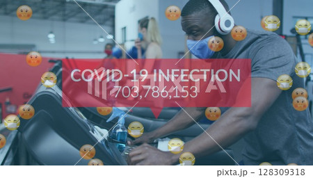 Image of words covid-19 infections and emojis over diverse group wearing face masks working out Image of words covid-19 infections and emojis over diverse group wearing face masks working out 128309318