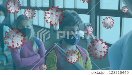 Image of covid-19 cells floating over a group of kids having their temperature checked Image of covid-19 cells floating over a group of kids having their temperature checked 128310449
