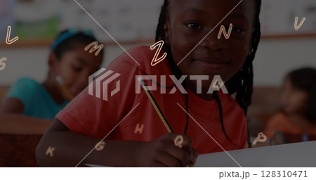 Image of letters changing over smiling schoolgirl wiritng Image of letters changing over smiling schoolgirl wiritng 128310471
