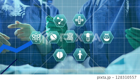 Multiple medical icons against mid section of team of surgeons performing operation Multiple medical icons against mid section of team of surgeons performing operation 128310557
