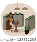 The girl is working on a laptop from a cafe. 128311205