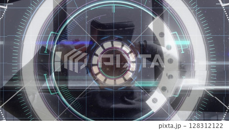 Light trails over neon scope scanner against caucasian senior man removing vr headset at office Light trails over neon scope scanner against caucasian senior man removing vr headset at office 128312122