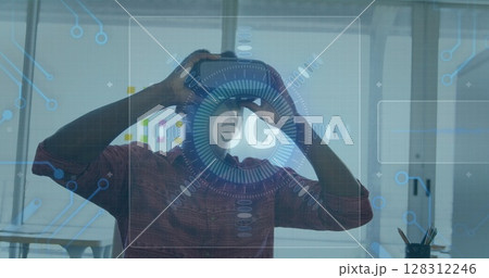 Image of 6g text, scope scanning and circuit board elements over man wearing vr headset Image of 6g text, scope scanning and circuit board elements over man wearing vr headset 128312246