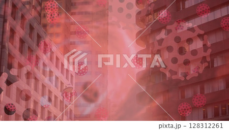 Image of covid 19 cells floating over cityscape on red background 128312261