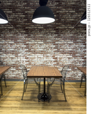 Inviting space with wooden tables and clear chairs in a modern library setting Inviting space with wooden tables and clear chairs in a modern library setting 128312511