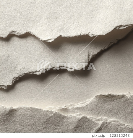 Abstract composition of torn paper, featuring textured edges and soft shadows. 128313248