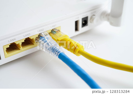 Ethernet cable with wireless router connect to internet service provider network. 128313284