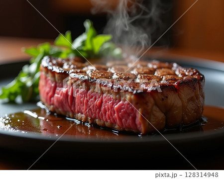 Juicy Medium-Rare Steak with Crispy Sear and Rising Steam on Elegant Plate in Warm Light 128314948