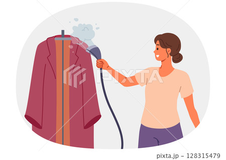 Steam iron in hand of woman caring for clothes after washing and enjoying housework 128315479