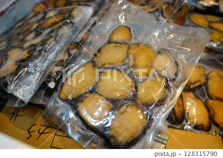 Frozen Vacuum-Packed Abalone for Sale at Korean Seafood Market 128315790