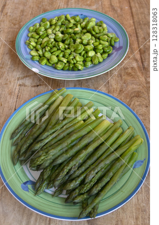Fresh Steamed Green Asparagus on Plate  128318063