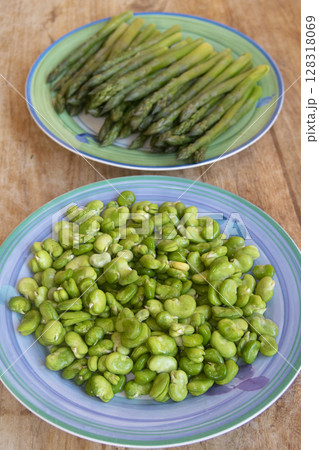 Fresh Steamed Green Asparagus on Plate  128318069