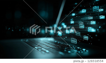 Laptop with glowing digital file icons representing data transfer and technology concepts 128318554