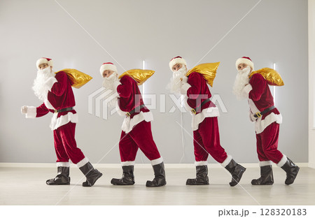 Happy New Year Santa Claus cute group carrying sacks, presenting gift box, partying fun Happy New Year Santa Claus cute group carrying sacks, presenting gift box, partying fun 128320183