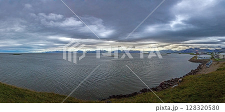 Panoramic view of Hofn Iceland with Vatnajokull glacier and dramatic sky Panoramic view of Hofn Iceland with Vatnajokull glacier and dramatic sky 128320580