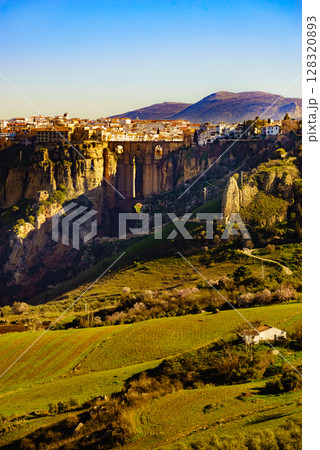Ronda town with old bridge, Andalusia, Spain. Ronda town with old bridge, Andalusia, Spain. 128320893