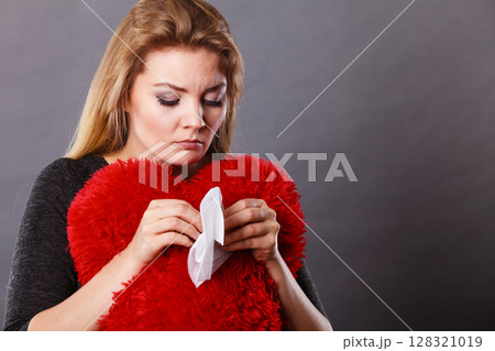 Sad, heartbroken woman crying having depression 128321019