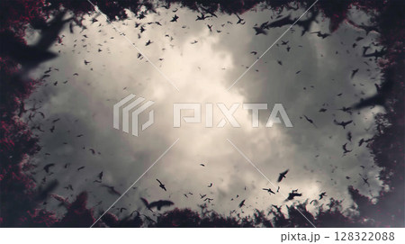 渦巻く雲の中を舞う無数の鳥たちが不安と恐怖を掻き立てる光景 128322088