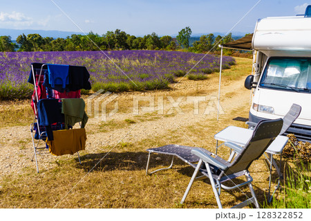 Clothes hanging to dry outdoors by camping car. Caravan vacation in France 128322852