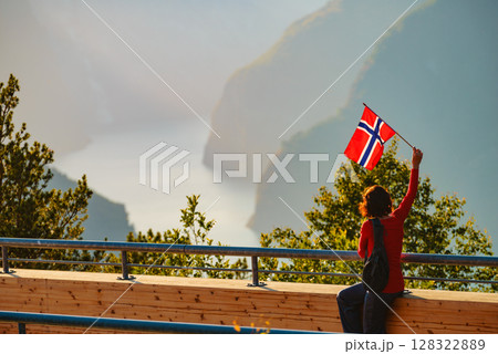 Tourist enjoy fjord view on Stegastein viewpoint Norway Tourist enjoy fjord view on Stegastein viewpoint Norway 128322889