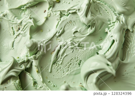 This is a detailed close up of a vibrant green frosting on a cake. AI-generated content. 128324396