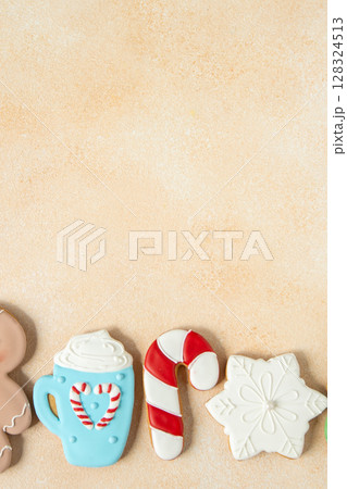 Gingerbread cookies with icing decoration. Christmas food. Baking tradition on Holliday. Top view table. Xmas sweet copy space background Gingerbread cookies with icing decoration. Christmas food. Baking tradition on Holliday. Top view table. Xmas sweet copy space background 128324513