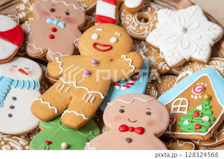 Set different gingerbread cookies with icing decoration. Christmas baking food. Gingerbread man. Xmas sweets treats background 128324568