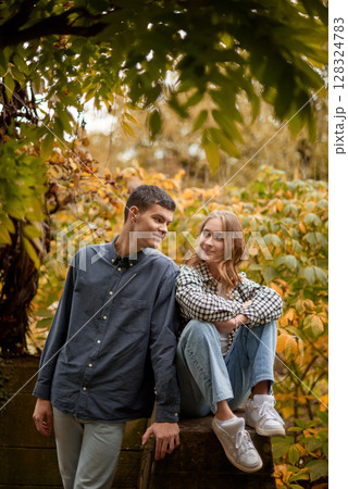 Young Cute Female Hugs Boyfriend. In Autumn Outdoor. Lovers Walking in Park. Attractive Funny Couple. Lovestory in Forest. Man and Woman. Cute Lovers in the Park. Family Concept. Happy Couple. Young Cute Female Hugs Boyfriend. In Autumn Outdoor. Lovers Walking in Park. Attractive Funny Couple. Lovestory in Forest. Man and Woman. Cute Lovers in the Park. Family Concept. Happy Couple. 128324783