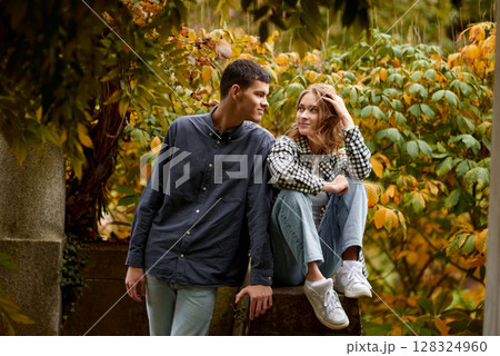 Young Cute Female Hugs Boyfriend. In Autumn Outdoor. Lovers Walking in Park. Attractive Funny Couple. Lovestory in Forest. Man and Woman. Cute Lovers in the Park. Family Concept. Happy Couple. Young Cute Female Hugs Boyfriend. In Autumn Outdoor. Lovers Walking in Park. Attractive Funny Couple. Lovestory in Forest. Man and Woman. Cute Lovers in the Park. Family Concept. Happy Couple. 128324960