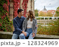 Young Cute Female Hugs Boyfriend. In Autumn Outdoor. Lovers Walking in Park. Attractive Funny Couple. Lovestory in Forest. Man and Woman. Cute Lovers in the Park. Family Concept. Happy Couple. 128324969