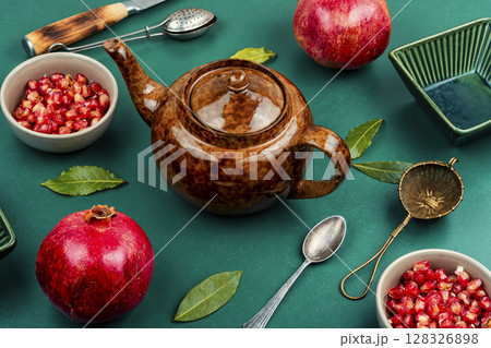 Tea with fresh pomegranate. Tea with fresh pomegranate. 128326898