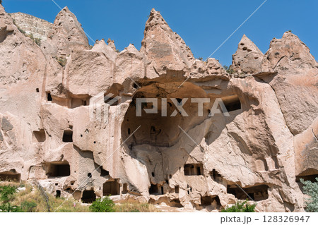 Ancient rock-cut monastery and cave dwellings in Zelve Open Air Museum, Cappadocia, Turkey 128326947