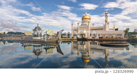 Omar Ali Saifuddien Mosque stands majestically in Bandar Seri Begawan, Brunei, against a bright blue sky Omar Ali Saifuddien Mosque stands majestically in Bandar Seri Begawan, Brunei, against a bright blue sky 128326990