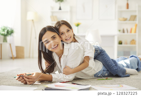 Mother and daughter happy time at home, active joy with preschool child at home, together Mother and daughter happy time at home, active joy with preschool child at home, together 128327225