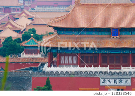 China Beijing 4.05.25 An Awe-Inspiring View of Ancient Architecture: Discover the Stunning Roofs and Structures of the Famous Forbidden City in Beijing, China, with Lush Greenery and Rich Historical China Beijing 4.05.25 An Awe-Inspiring View of Ancient Architecture: Discover the Stunning Roofs and Structures of the Famous Forbidden City in Beijing, China, with Lush Greenery and Rich Historical 128328546