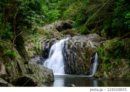 Along the Crystal Cascades near Cairns in Far North Queensland, locals and tourists enjoy swimming, hiking, picnicking, and exploring lush rainforest and freshwater streams. Along the Crystal Cascades near Cairns in Far North Queensland, locals and tourists enjoy swimming, hiking, picnicking, and exploring lush rainforest and freshwater streams. 128328655