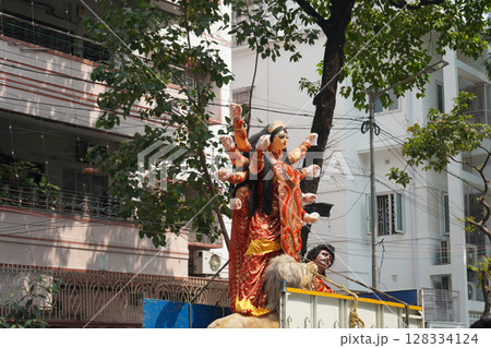 Transporting a Fully Decorated Durga Idol from Kumartuli to pandal Transporting a Fully Decorated Durga Idol from Kumartuli to pandal 128334124