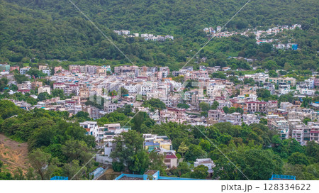 July 5 2025 View of a Scenic Residential Area Surrounded by Lush Greenery 128334622