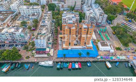 July 5 2025 Scenic Coastal Town by the Harbor with Boats and Hills 128334646