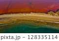 Red salt sea lake, at winter, village Alyki, Boeotia, Greece. 128335114