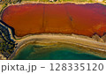 Red salt sea lake, at winter, village Alyki, Boeotia, Greece. 128335120