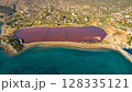Red salt sea lake, at winter, village Alyki, Boeotia, Greece. 128335121