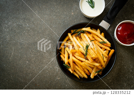 French fries with sour cream and ketchup French fries with sour cream and ketchup 128335212