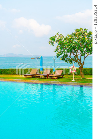 chair pool and umbrella around swimming pool chair pool and umbrella around swimming pool 128335214