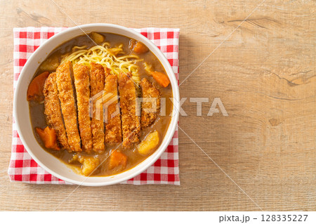 curry ramen noodles with tonkatsu fried pork cutlet curry ramen noodles with tonkatsu fried pork cutlet 128335227